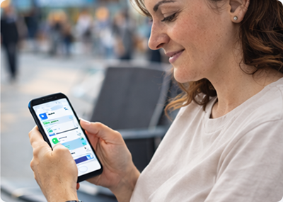 Club member consulting FlightApp on her phone